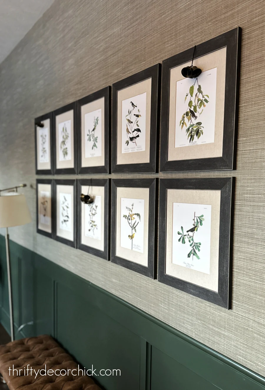 gallery wall on grasscloth wallpaper